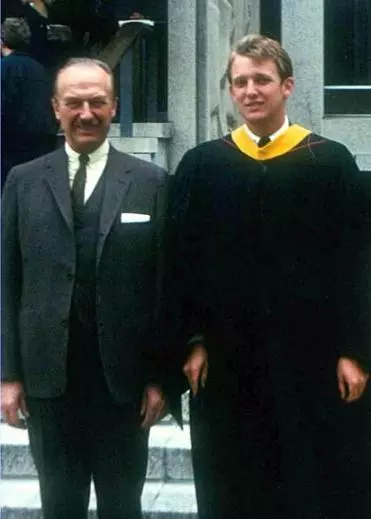 Donald Trump (right), wearing his graduation outfit, with his father Frederick Trump (left).